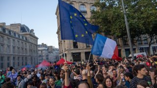 Supporters of the left wing union, New Popular Front, gather at the Place de la Republique on July 7, 2024 in Paris, France following the defeat of the far-right in France’s legislative elections.