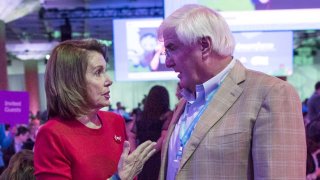 Then House Minority Leader Nancy Pelosi, a Democrat from California, center, speaks with Ron Conway, founder of SV Angel, right, during the DreamForce Conference in San Francisco, California, U.S., on Wednesday, Oct. 5, 2016.