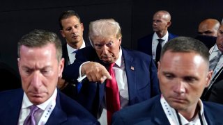 Former US President Donald Trump exits after attending the Republican National Convention (RNC) at the Fiserv Forum in Milwaukee, Wisconsin, US, on Monday, July 15, 2024. 