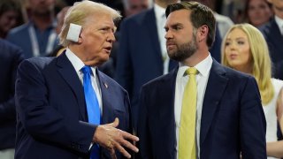 Republican presidential candidate former President Donald Trump is introduced during the Republican National Convention Tuesday, July 16, 2024, in Milwaukee. At right is Republican vice presidential candidate Sen. JD Vance, R-Ohio.