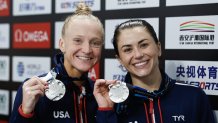 Sarah Bacon and Kassidy Cook of United States poses with their silver medals after the award ceremony for the Women's Synchronized 3m Springboard Final during the World Aquatics Diving World Cup 2024 at Xi'an Aoti Aquatic Centre on April 19, 2024 in Xi An, China.