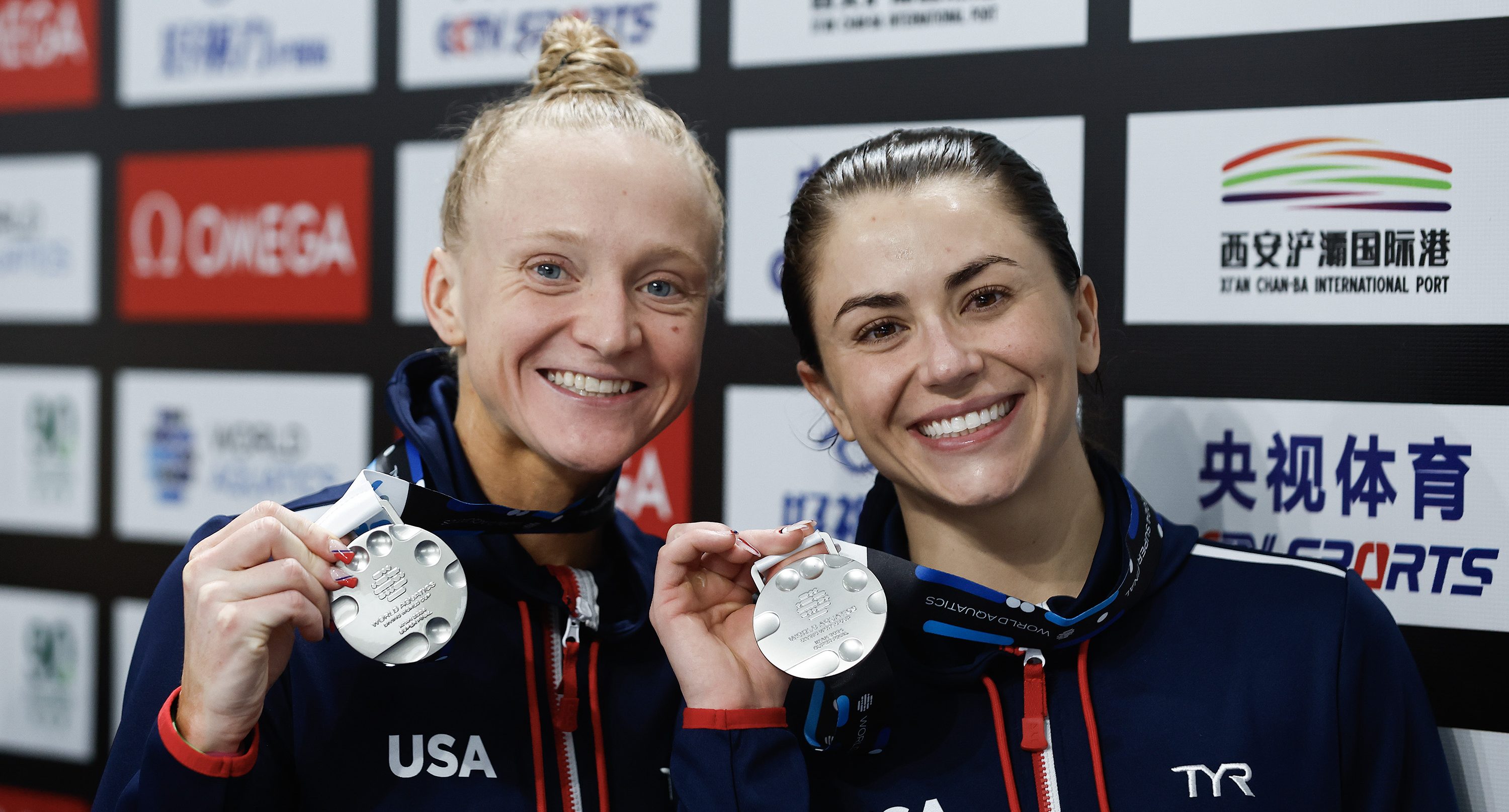 Sarah Bacon and Kassidy Cook of United States poses with their silver medals after the award ceremony for the Women's Synchronized 3m Springboard Final during the World Aquatics Diving World Cup 2024 at Xi'an Aoti Aquatic Centre on April 19, 2024 in Xi An, China.