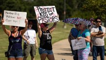 People gather outside Gateway Church in protest of child sexual abuse in the church following allegations against Robert Morris, on Saturday, June 22, 2024, in Southlake, Texas. (Chris Torres/Fort Worth Star-Telegram/Tribune News Service via Getty Images)