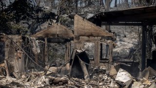 A home destroyed by the Park Fire is seen in Chico, Calif.