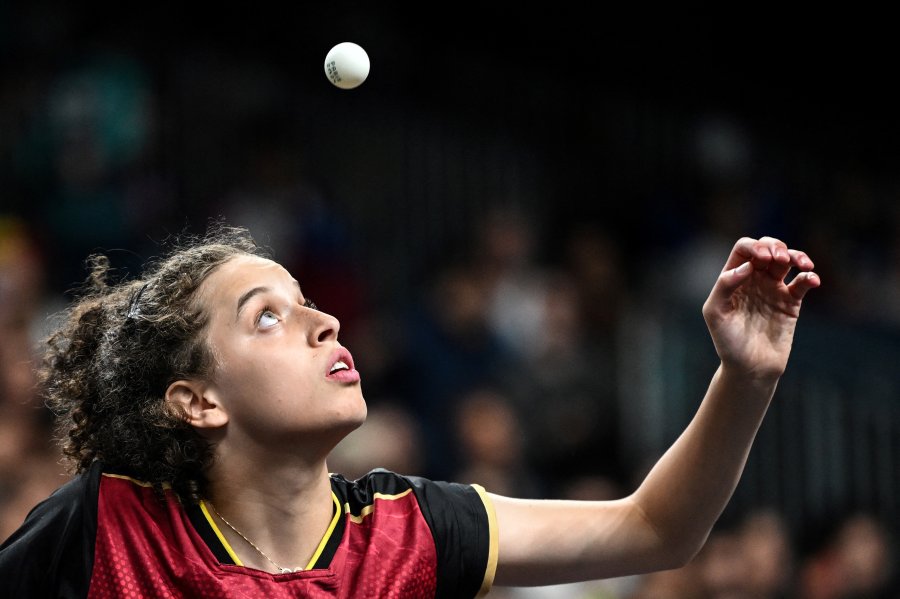 Egypt's Hana Goda eyes the ball as she prepares to serve it against Netherlands' Britt Eerland during the women's table tennis singles round