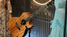 LONDON, ENGLAND - JULY 24: Customised guitar used by Taylor Swift during the Soul2Soul II Tour on display at the Taylor Swift "Songbook Trail" photocall at The V&A on July 24, 2024 in London, England. (Photo by Gareth Cattermole/Getty Images)