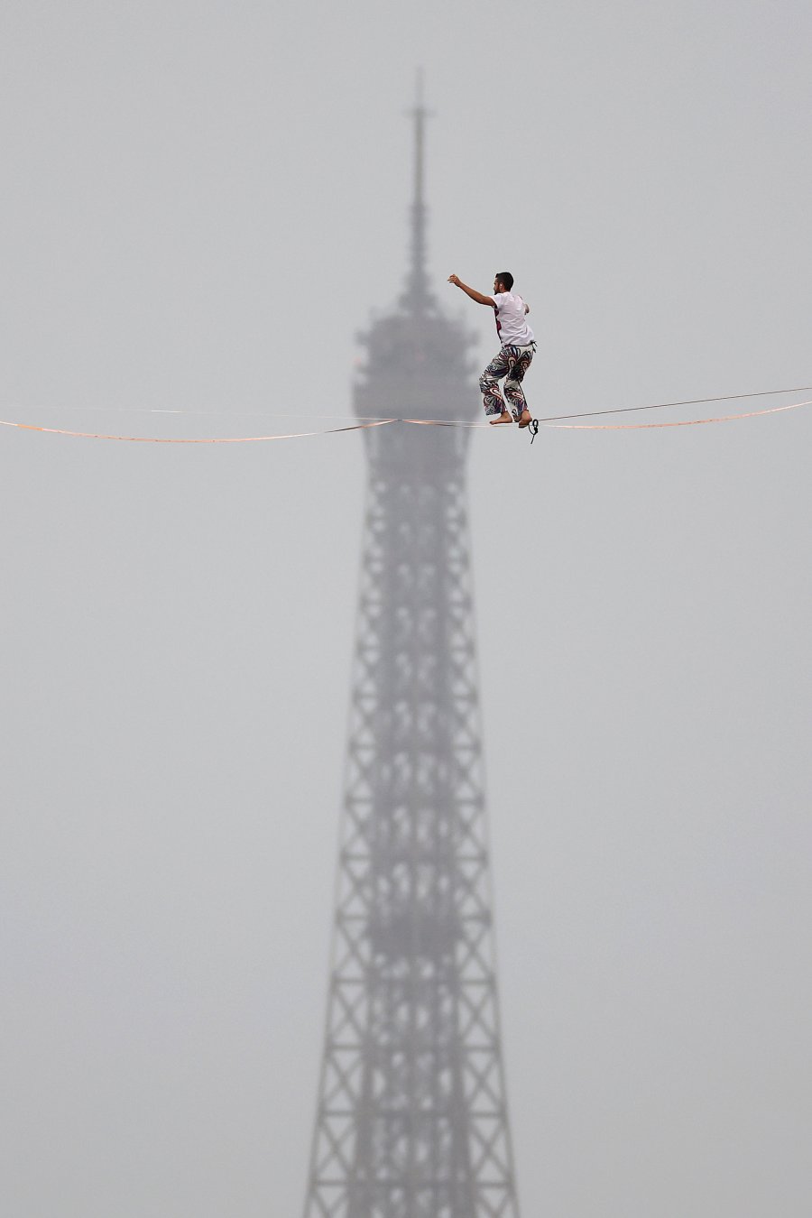 Tightrope walker Nathan Paulin performs