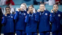 USA Artistic Gymnastics Women's National Team athletes Simone Biles (L), Jordan Chiles (C), Jade Carey (2nd L), Sunisa Lee (2nd R) and Healy Rivera (R), who won the gold medal, pose with their medals after the Artistic Gymnastics Women's Team Final on day four of the Olympic Games Paris 2024 at the Bercy Arena in Paris, France on July 30, 2024. 