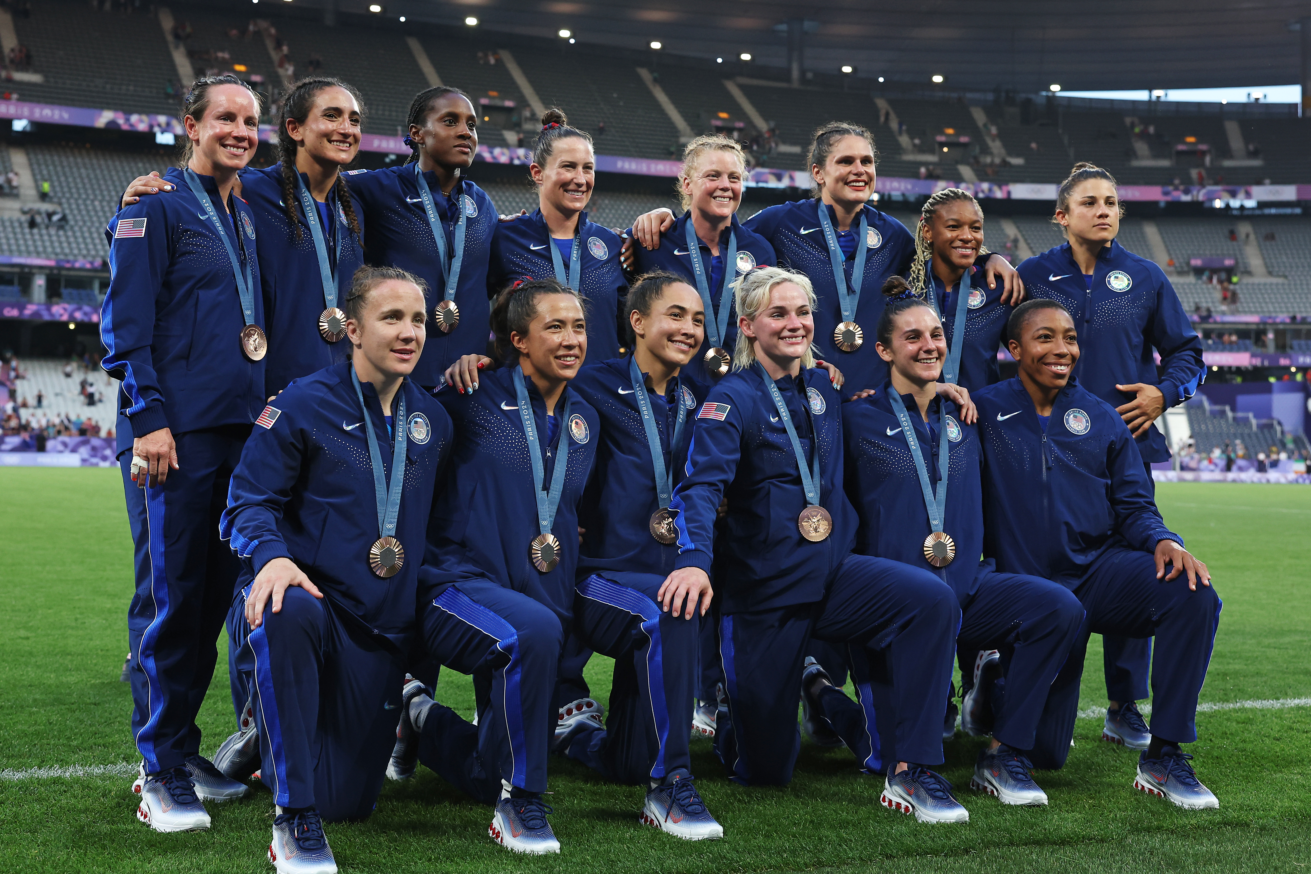 Bronze medalists of Team United States pose after the Women's Rugby Sevens medal ceremony following the Women's Rugby Sevens matches on day four of the Olympic Games Paris 2024 at Stade de France on July 30, 2024 in Paris, France. 