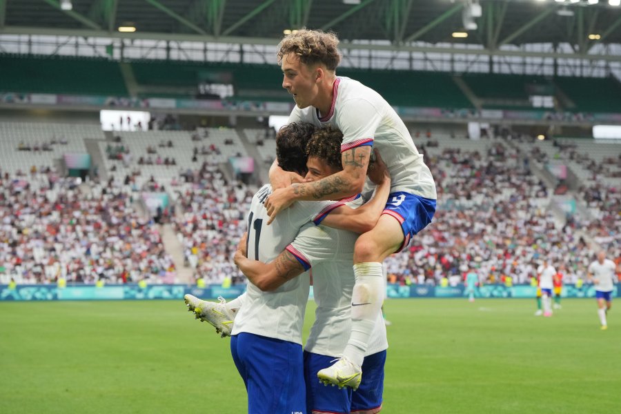 US' Kevin Paredes celebrates scoring with teammates