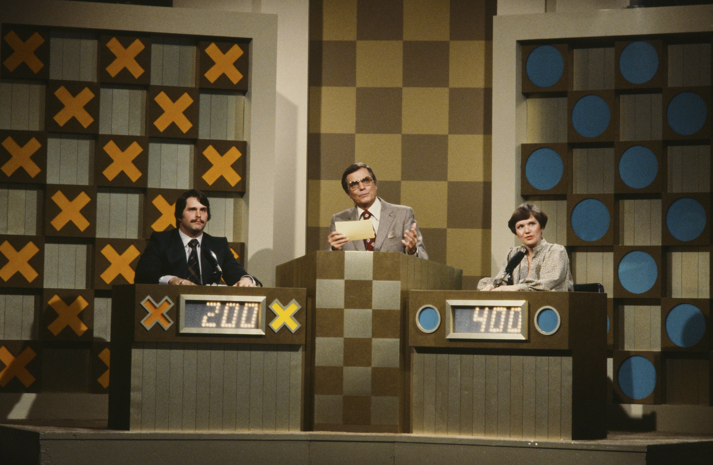 Longtime Hollywood Squares host Peter Marshall, center.