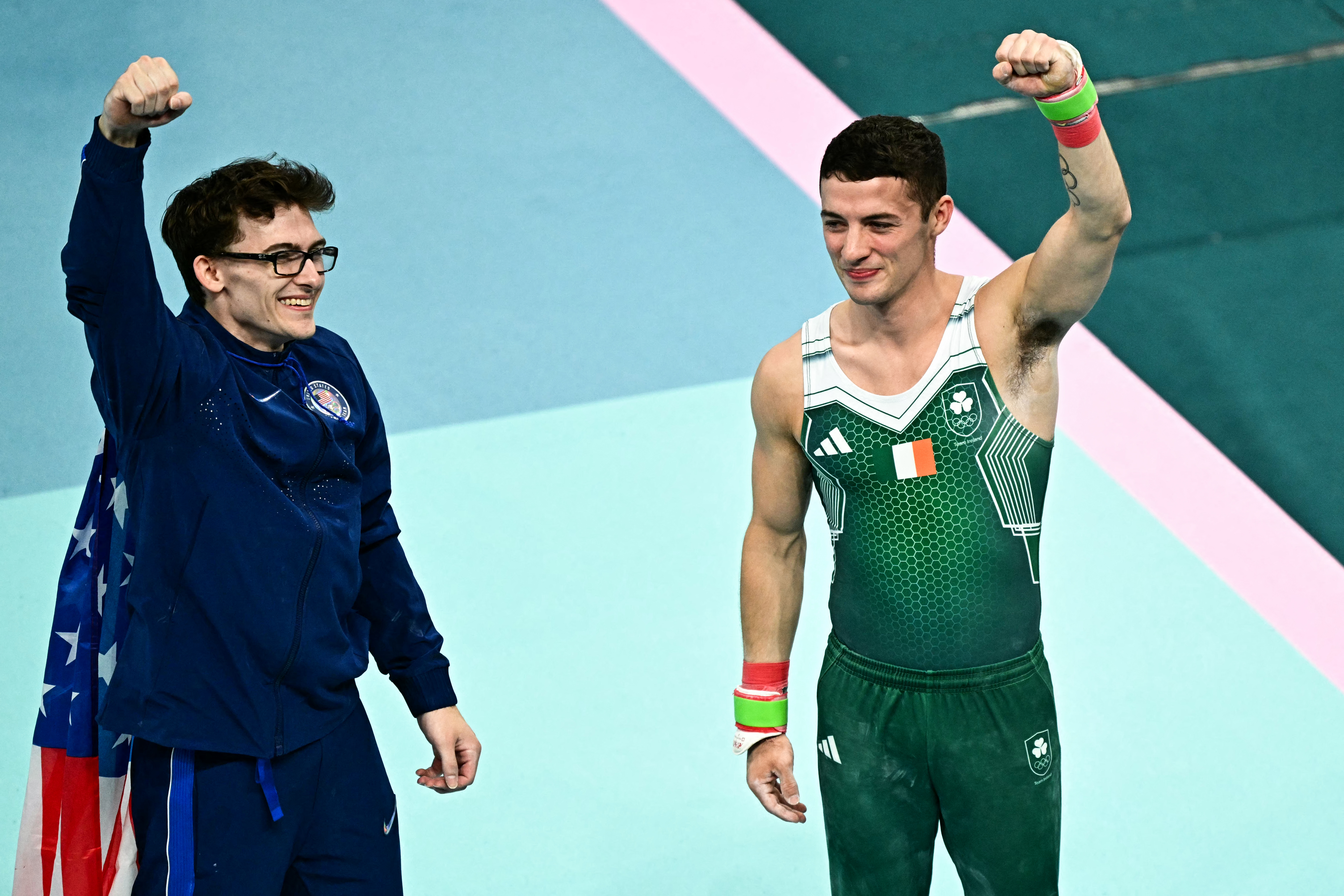 Worcester native Stephen Nedoroscik, left, and Ireland's Rhys Mc Clenaghan celebrate after winning bronze and gold, respectively, in the men's pommel horse final at the Bercy Arena in Paris on Saturday, Aug. 3, 2024, during the 2024 Paris Olympic Games.