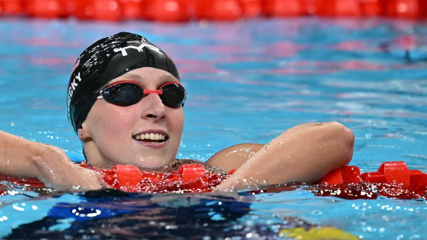 Katie Ledecky celebrates after winning the final of the women's 800m freestyle swimming event during the Paris 2024 Olympic Games at the Paris La Defense Arena in Nanterre, west of Paris, on August 3, 2024.