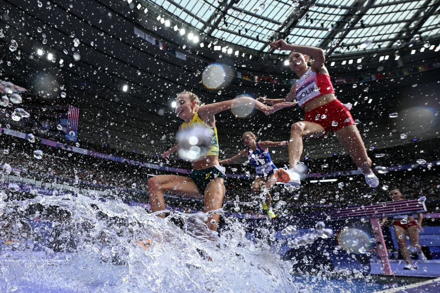 Athletes compete in the women's 3000m steeplechase heat of the athletics event at the Paris 2024 Olympic Games at Stade de France in Saint-Denis, north of Paris, on August 4, 2024