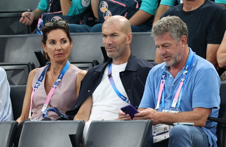 Zinedine Zidane (C) and his wife Veronique (L) are seen prior to the Artistic Gymnastics Women's All-Around Final