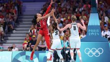 LILLE, FRANCE - AUGUST 01: A'Ja Wilson #9 of Team United States shoots over Maxuella Lisowa Mbaka #31 of Team Belgium during a Women's Basketball Group Phase - Group C game between the United States and Belgium on day six of the Olympic Games Paris 2024 at Stade Pierre Mauroy on August 01, 2024 in Lille, France. (Photo by Gregory Shamus/Getty Images)