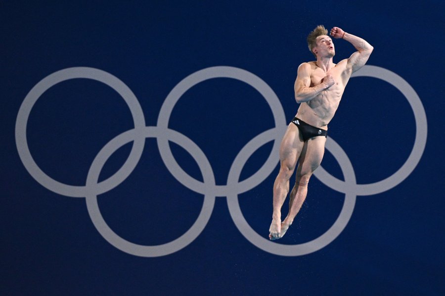 Britain's Jack Laugher competes in the men's 3m springboard diving semi-final during the Paris 2024 Olympic Games at the Aquatics Centre in Saint-Denis, north of Paris, on August 7, 2024