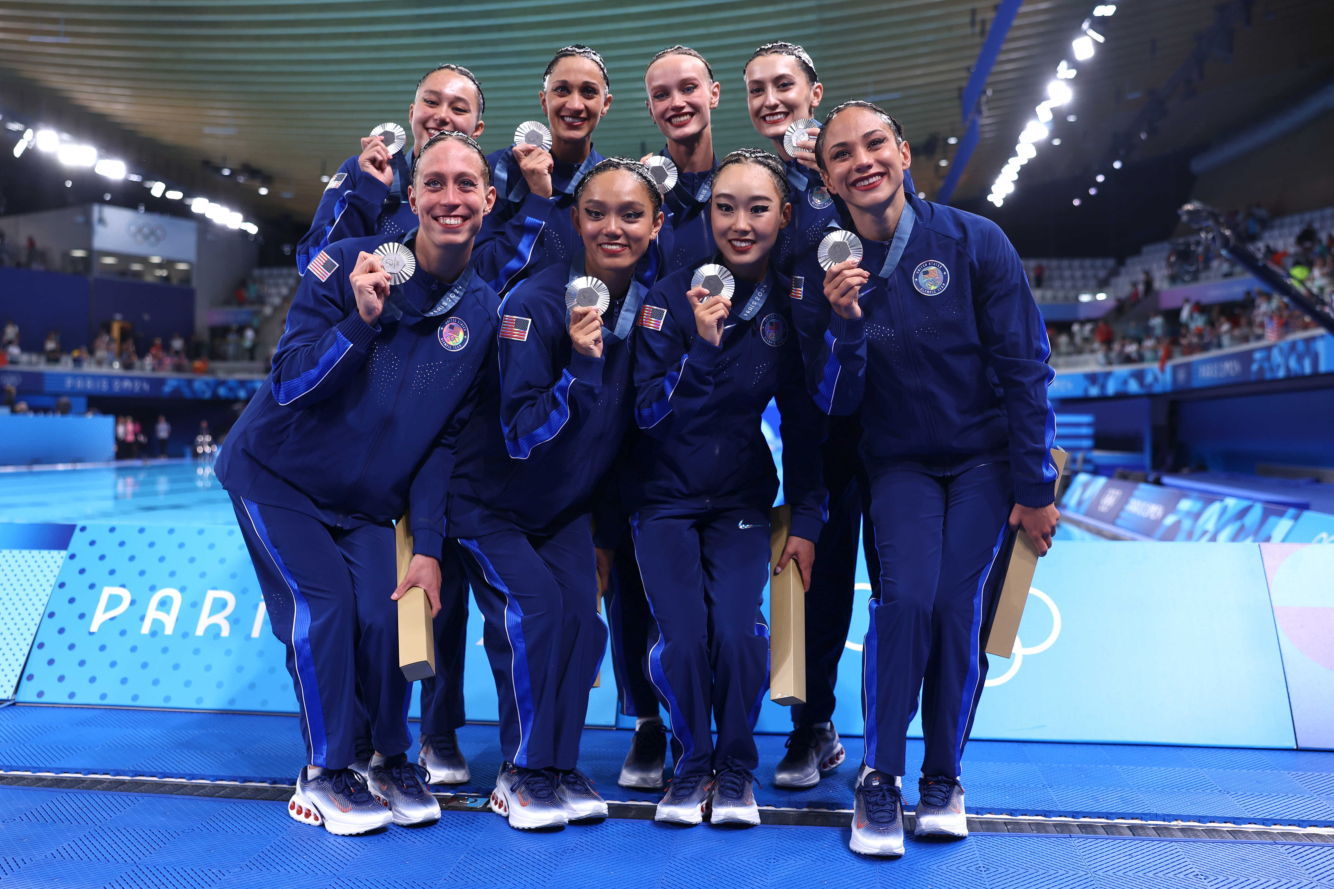 Silver Medalists of Team United States -- including Megumi Field -- pose following the Artistic Swimming medal ceremony after the Team Acrobatic Routine on day twelve of the Olympic Games Paris 2024