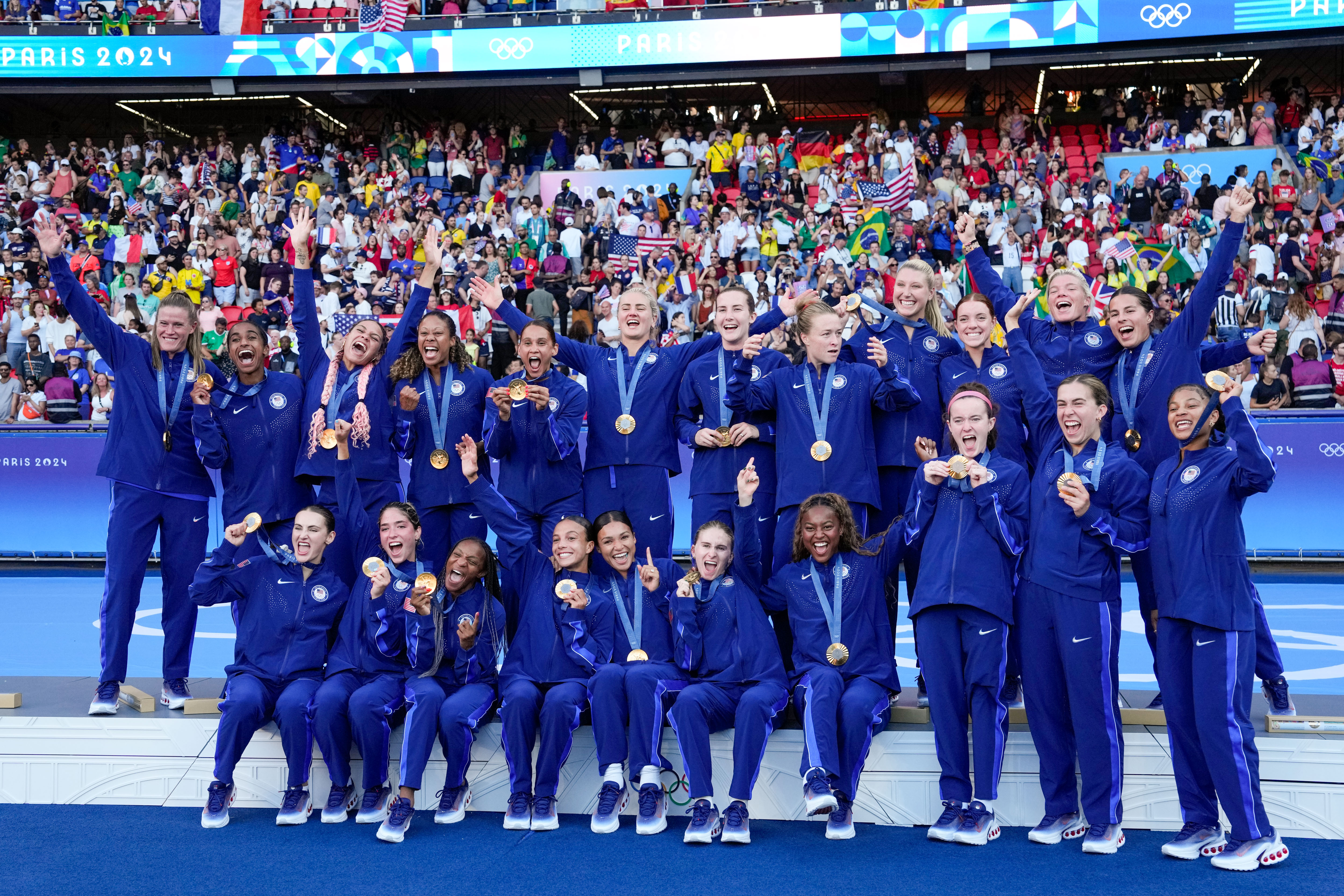 USWNT celebrating Paris Olympics gold.