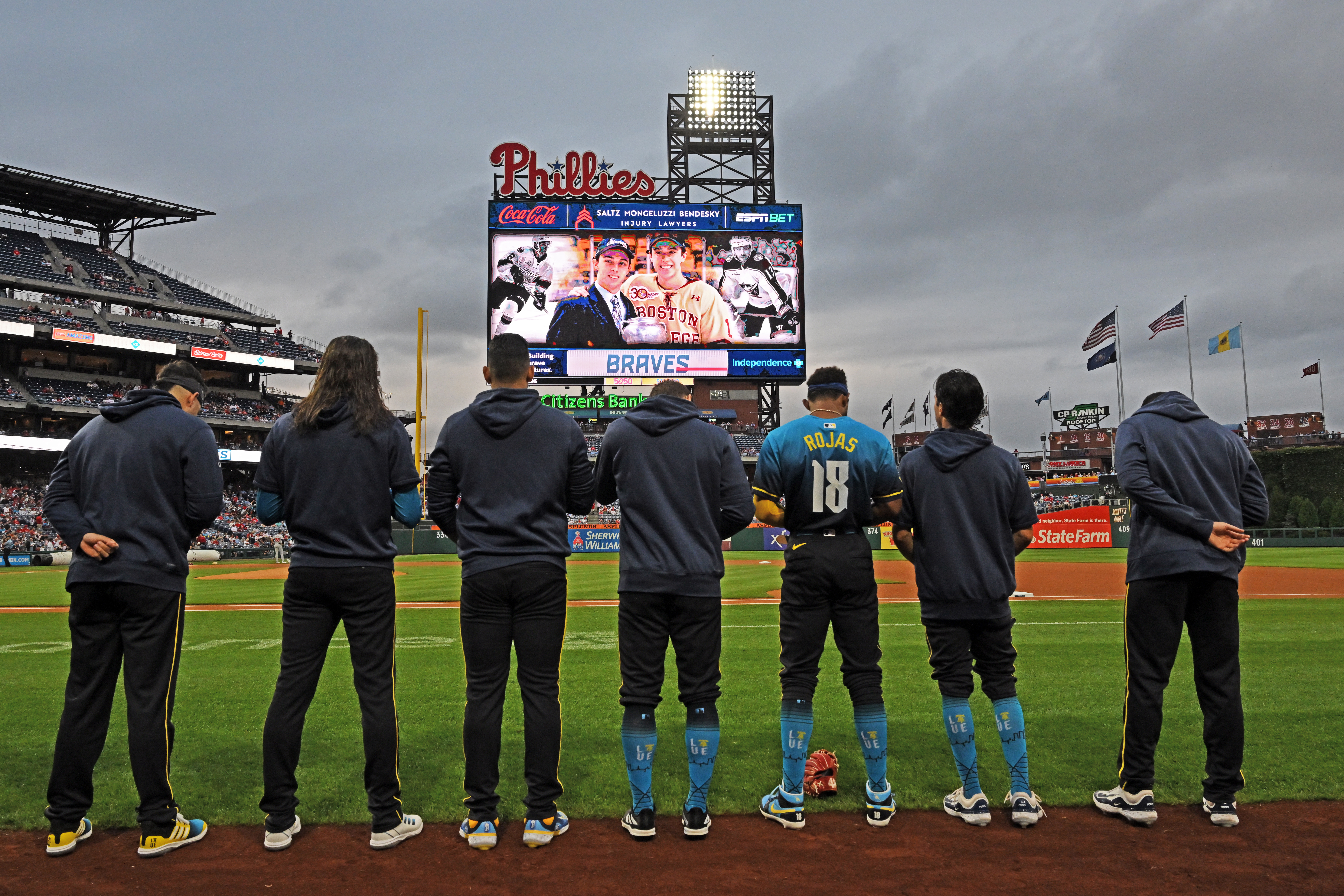 The Philadelphia Phillies observe a moment of silence in honor of Columbus Blue Jackets hockey player Johnny Gaudreau and his brother Matthew