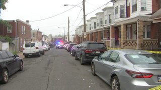 Police investigate after a man was stabbed to death on the 300 block of North Simpson Street in Philadelphia.