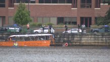 A man and his toddler in the Charles River as they were being rescued by a duck boat on Monday, Aug. 19, 2024.