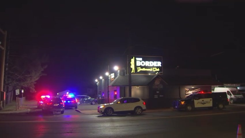 Police vehicles and crime scene tape surrounds The Border Gentleman's Club in Bucks County after a shooting there early Thursday, Aug. 29, 2024.