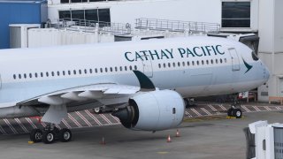 A Cathay Pacific Airbus A350 aircraft at Kingsford Smith Airport on August 18, 2021 in Sydney, Australia. Cathay Pacific Airways Ltd., is the flag carrier of Hong Kong with its main hub being at Hong Kong International Airport.