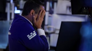 A trader works on the floor at the New York Stock Exchange (NYSE) in New York City, U.S., September 4, 2024.