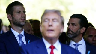 (L to R) Eric Trump, former US President and Republican presidential candidate Donald Trump and Donald Trump, Jr. attend a remembrance ceremony on the 23rd anniversary of the September 11 terror attack on the World Trade Center at Ground Zero, in New York City on September 11, 2024. 