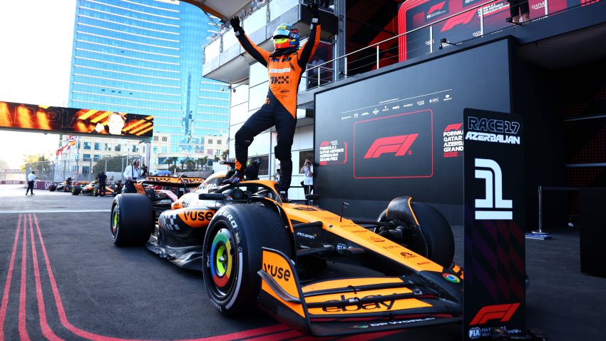 Race winner Oscar Piastri of Australia and McLaren celebrates