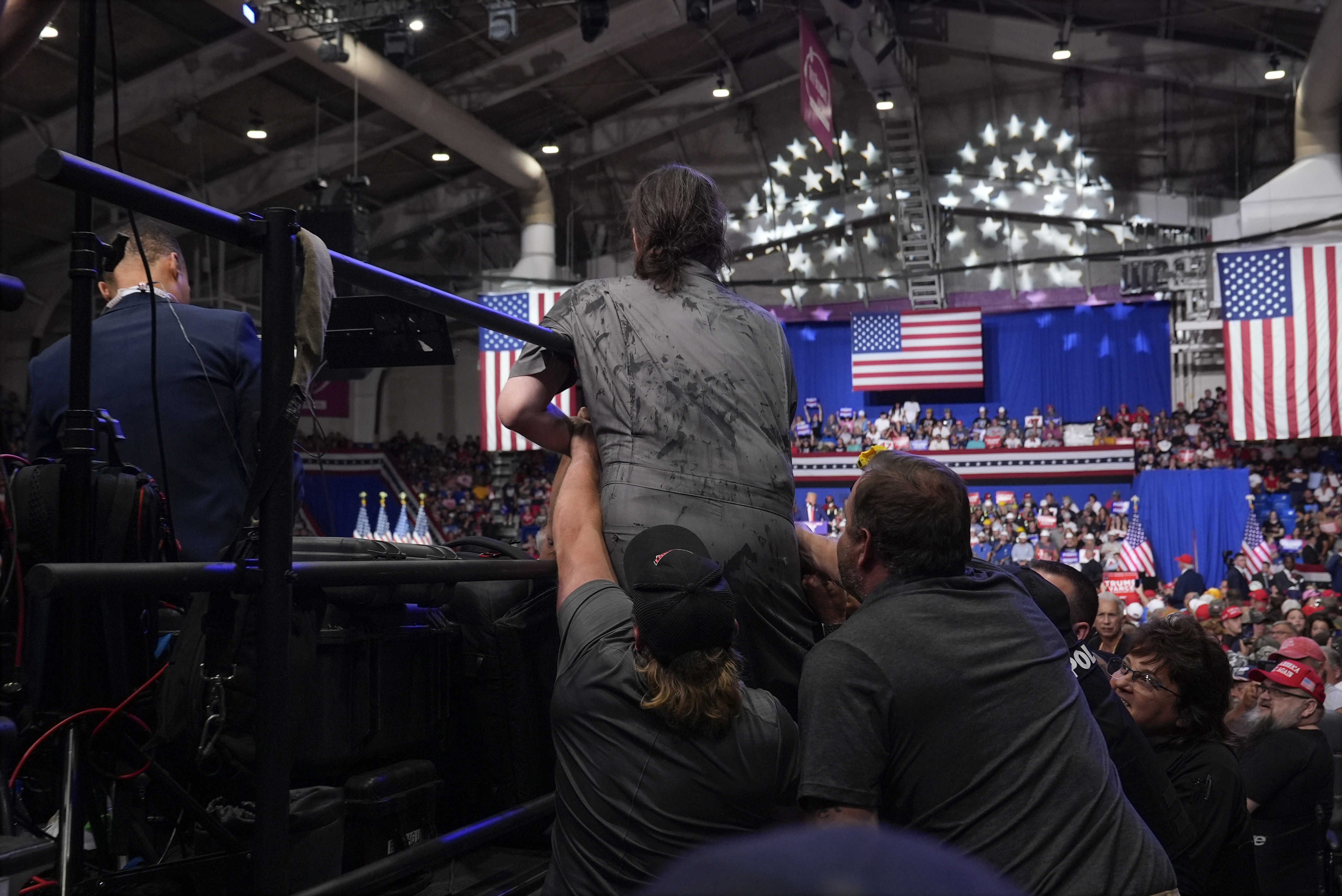 Man arrested at Trump rally in Pa. wanted to hang a protest banner,
police say