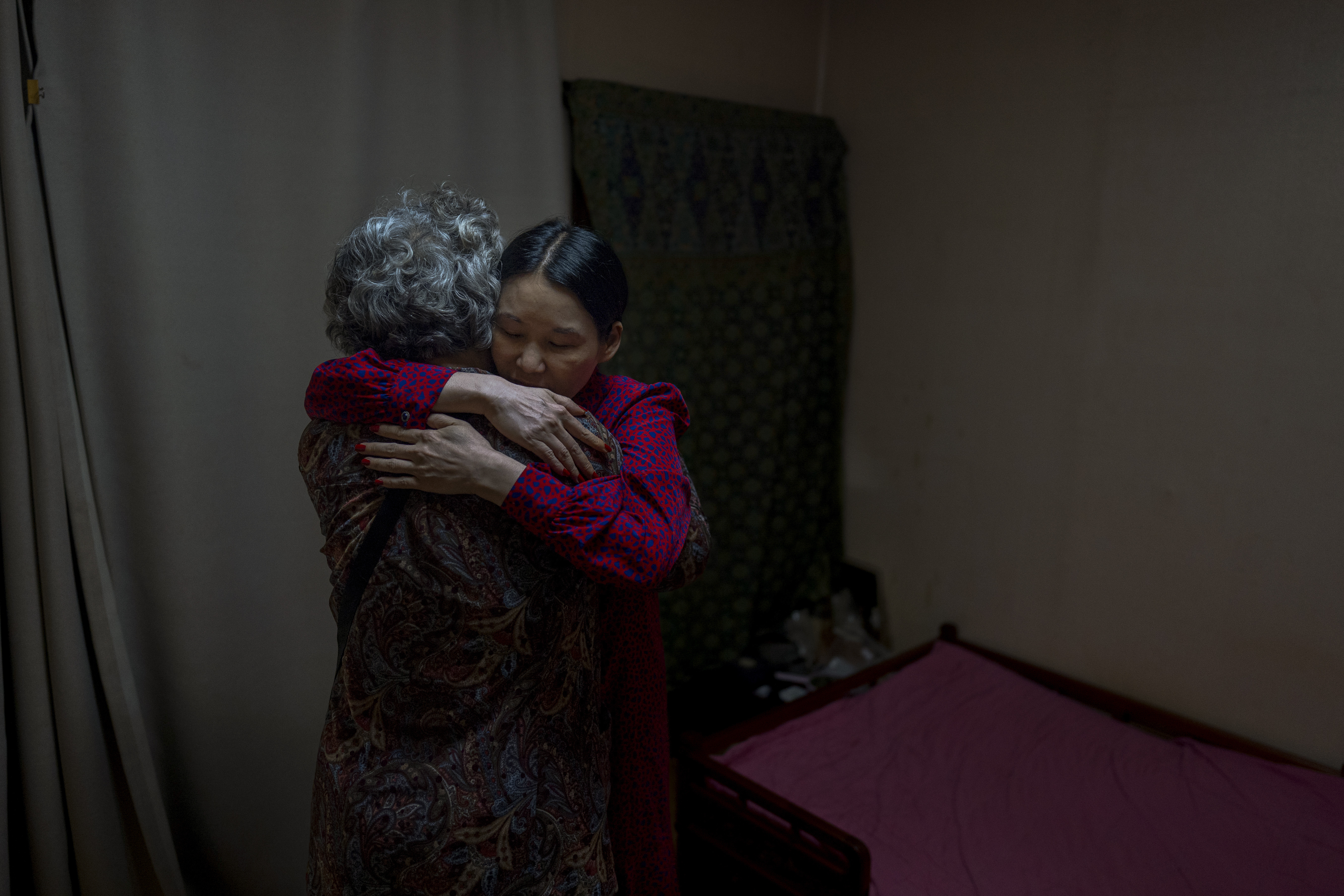 Yooree Kim, right, who was 11 when she was adopted from South Korea to a couple in France, hugs her biological mother, who had come to visit her in Seoul, South Korea, Friday, May 24, 2024. 