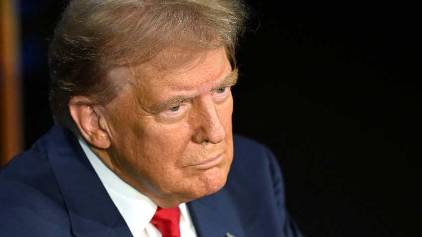 Former US President and Republican presidential candidate Donald Trump listens during a presidential debate with US Vice President and Democratic presidential candidate Kamala Harris at the National Constitution Center in Philadelphia, Pennsylvania, on September 10, 2024.