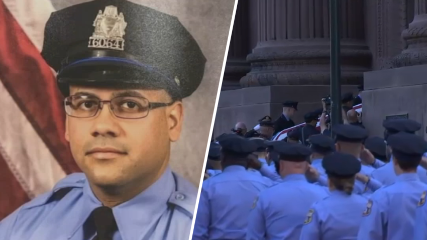 Photo of Officer Jaime Roman next to his casket