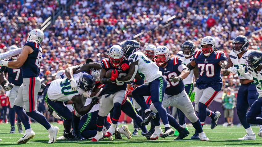 Sep 15, 2024; Foxborough, Massachusetts, USA; New England Patriots running back Rhamondre Stevenson (38) runs the ball against the Seattle Seahawks in the second quarter at Gillette Stadium. Mandatory Credit: David Butler II-Imagn Images