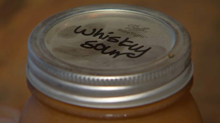 Whiskey sour written on jar lid