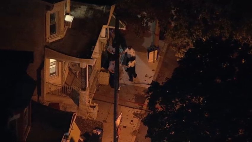 Officers standing outside home in North Philadelphia