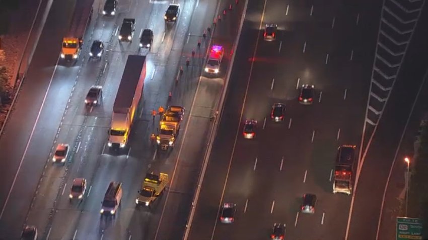 Crews work to reopen the roadway after an overturned dump truck caused lane closures on I-76 in South Jersey on Monday morning.