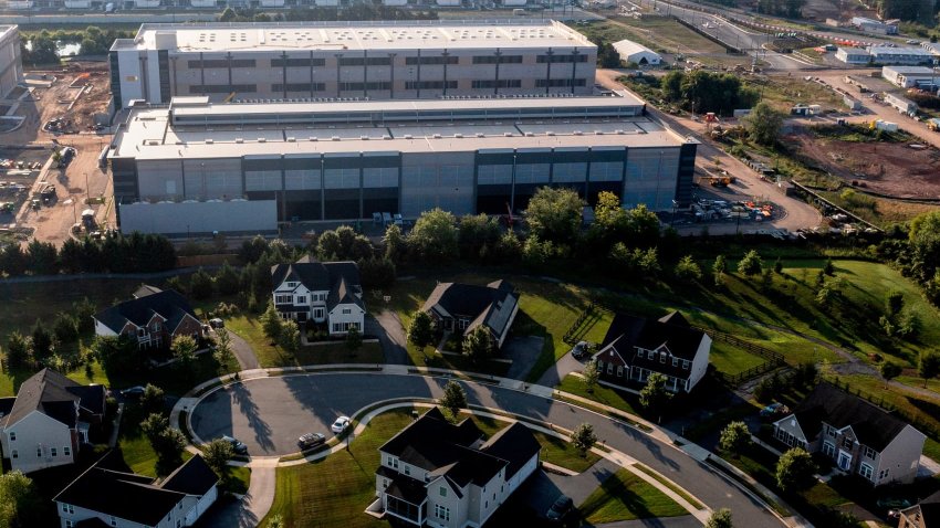 An Amazon Web Services data center in Stone Ridge, Virginia, US, on Sunday, July 28, 2024. Data center developers in Northern Virginia are asking utility Dominion Energy Inc. for as much power as several nuclear reactors can generate, in the latest sign of how artificial intelligence is helping drive up electricity demand.