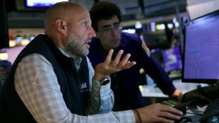 Traders work on the floor of the New York Stock Exchange during afternoon trading on October 03, 2024 in New York City. 