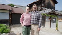 Dani and Evan Benton in front of Benton Guesthouse.