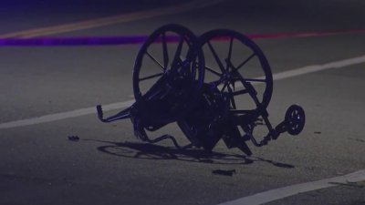 Damaged wheelchair marks spot where woman was struck, killed in hit-and-run