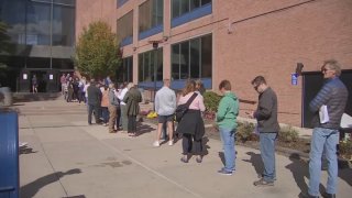 Voters wait in line to obtain mail-in ballots in Bucks County.