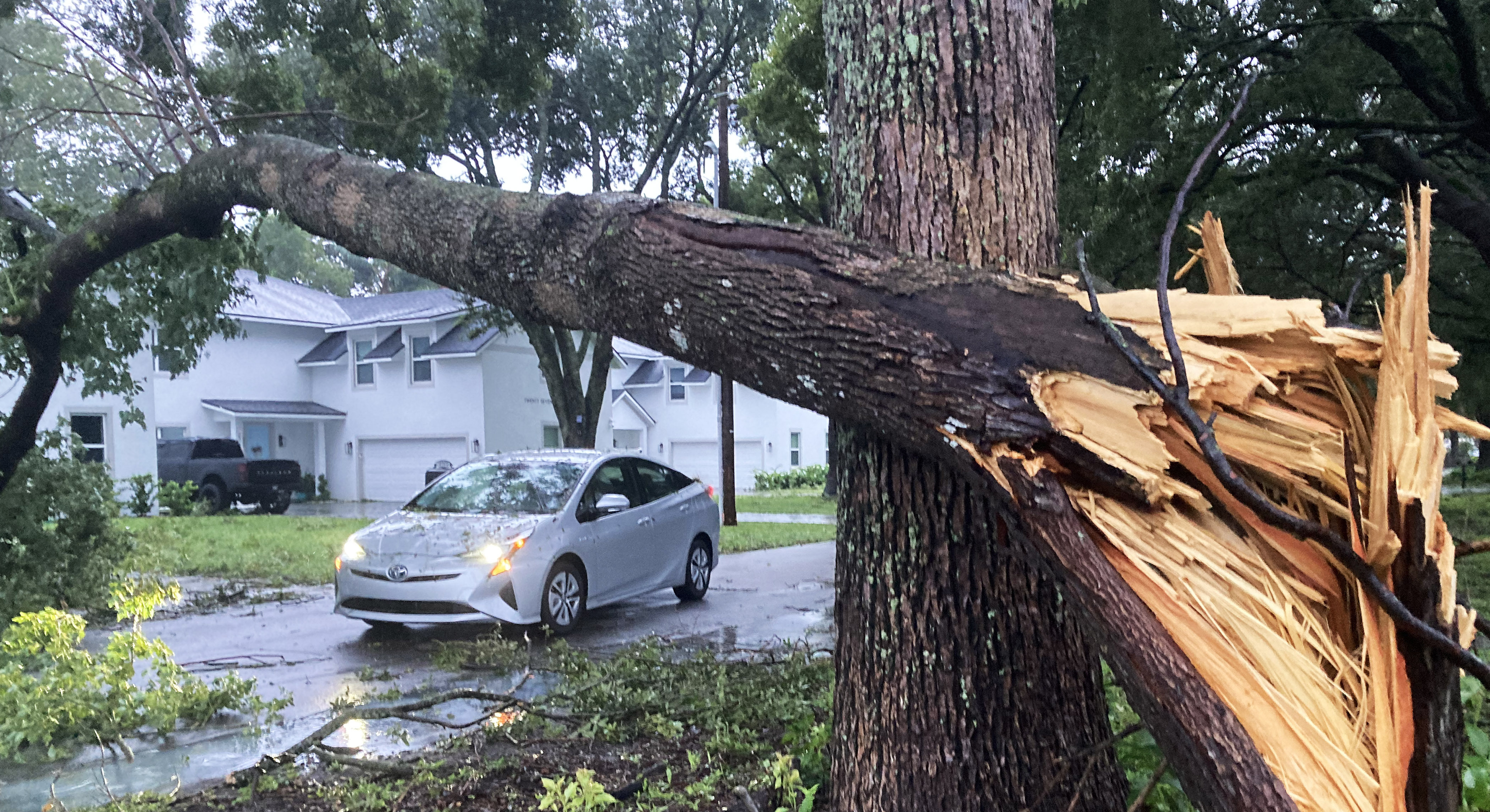 A tree lies over a street after Hurricane Milton passed through on October 10, 2024 in Orlando, Florida. The storm made landfall on Wednesday night on Florida's Gulf coast as a Category 3 hurricane before traveling across Central Florida, causing massive destruction and leaving 3 million Floridians without power.