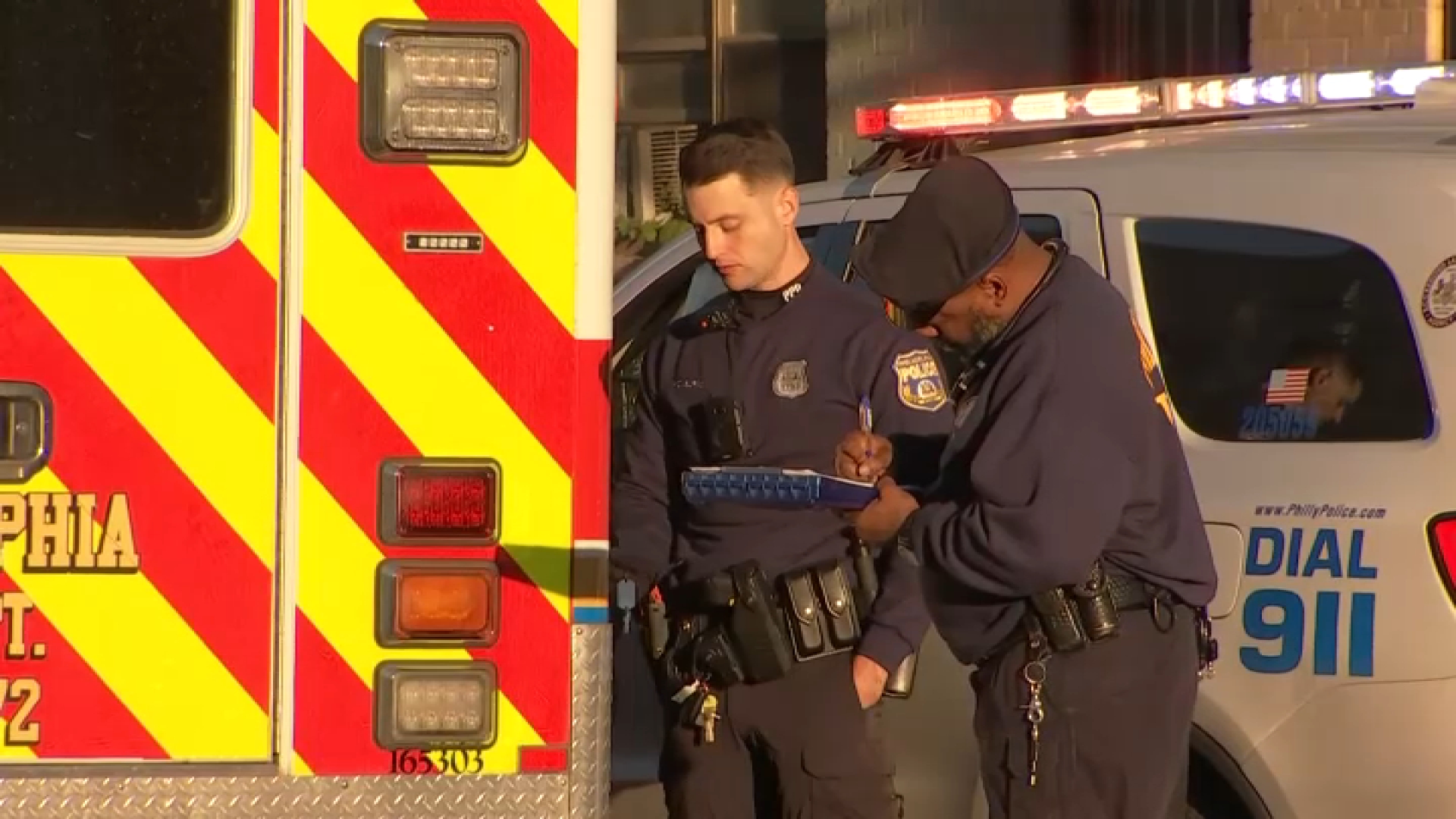 Police investigators at the scene after an EMT was attacked in an ambulance in North Philadelphia on Thursday morning. 