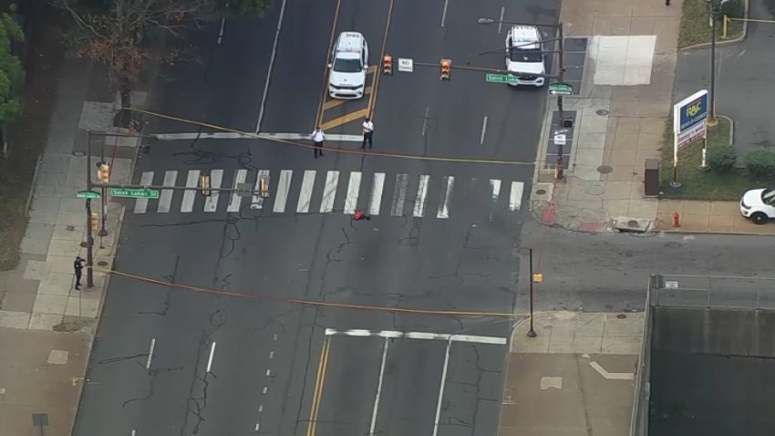 Police investigate after a person was shot along Broad Street in North Philadelphia on Monday morning.