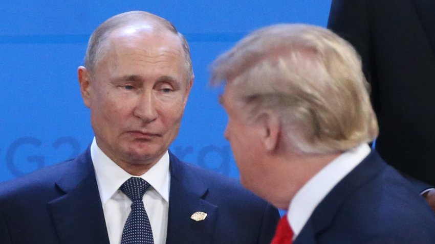 Russian President Vladimir Putin (L) looks at U.S. President Donald Trump during the welcoming ceremony prior to the G20 Summit’s Plenary Meeting on November 30, 2018 in Buenos Aires, Argentina. 