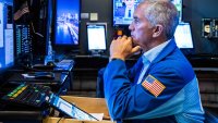 A trader works on the floor of the New York Stock Exchange on Aug. 4, 2022.