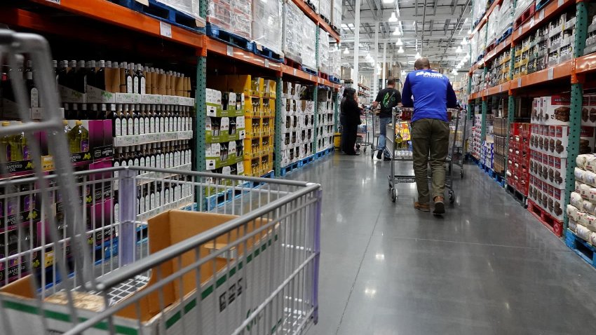 Customers shop at a Costco Wholesale store in Miami on Dec. 15, 2023.